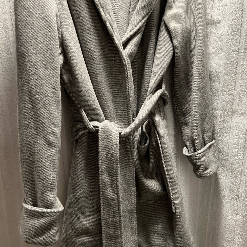 A New Day 3/4 length coat. Two snaps. Nice large pockets, big hood and belt.